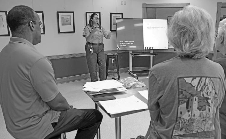 Laura McDonald, park ranger at the Prairie Acadian Cultural Center, gave a re-introduction of the center, which reopened around Mardi Gras earlier this year after being closed for about five years. During those years, the building was outfitted with a new air conditioning system and a new roof. (LSN photo by Claudette Olivier)