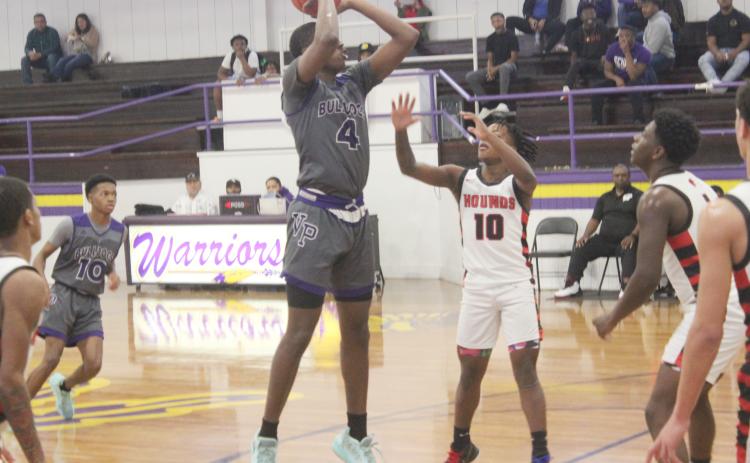 Montavis Seraille (4) attempts a basket for his Ville Platte Bulldogs against the Welsh Greyhounds on the third day of Oakdale’s New Year Tip-Off Presented by RoyOMartin, which was held back in January. (Gazette photo by Rhett Manuel)