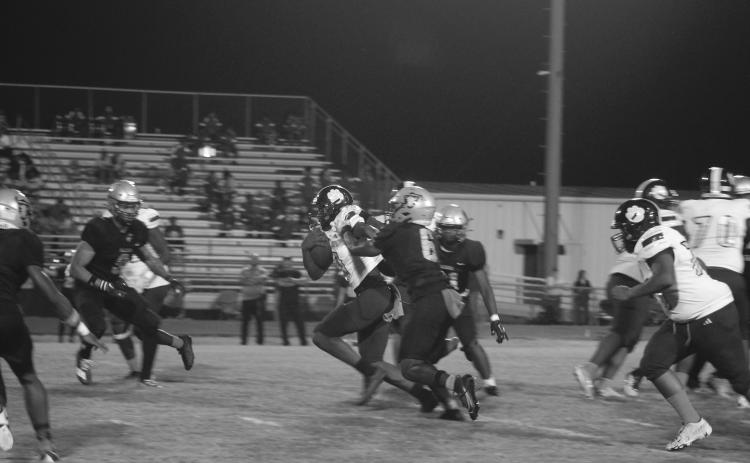 Ja’maury Thomas (0) shakes off a would be Northwest tackler as he fights for additional yardage in Ville Platte’s road district loss to Northwest, 42-0, last Friday night. (Gazette photo by Tony Marks)