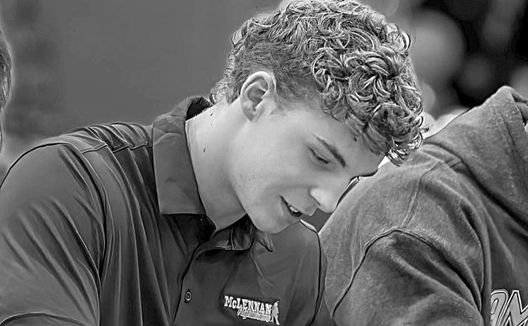 Owen Smith, the son of Gerard and Holly Smith and grandson of Terryl and Barbara Fontenot, is pictured as he signs with McLennan College. (Photo courtesy of Gerard Smith)