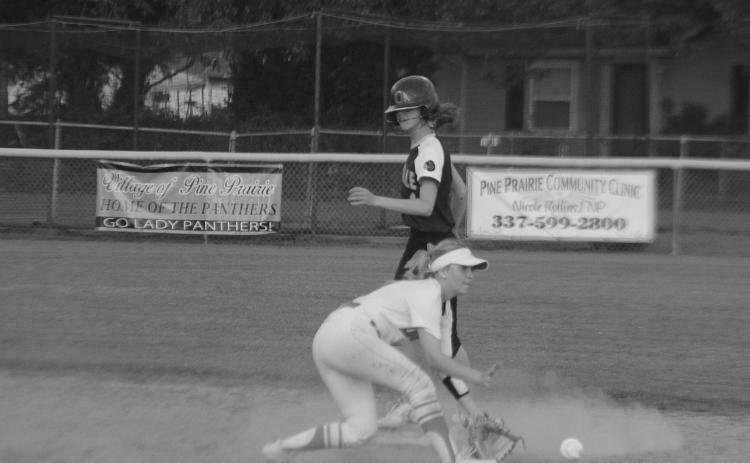 Pine Prairie shortstop Victoria Briscoe (1) attempts to make a play at second base as Oakdale base runner Jacee Adams safely reaches the bag. (LSN photo by Tony Marks)