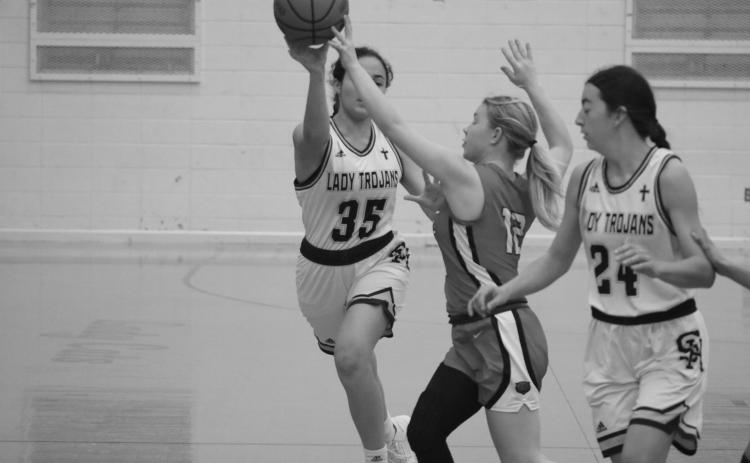 Sacred Heart’s Mary Perron (35) is able to get off a pass in the Lady Trojans’ 66-12 win over Basile to begin the parish tournament.