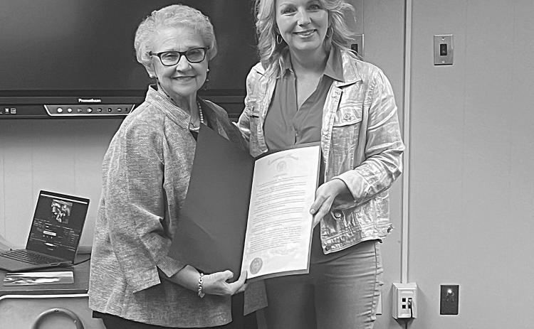 State Senator Heather Cloud (right) presents a state resolution to former Evangeline Parish School Board member, Peggy Forman (left). (Gazette photo by Tony Marks)