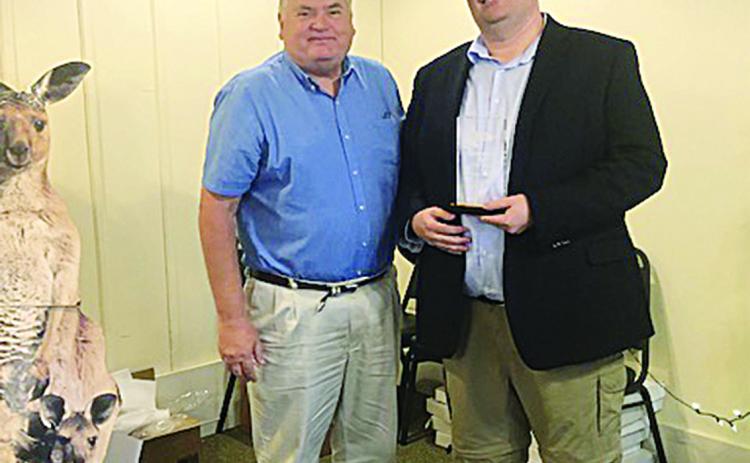 Raymond Partsch III was named Sportswriter of the Year at the Louisiana Sports Writers Association Awards Luncheon held Sunday, June 27, at Merci Beaucoup in Natchitoches. He is pictured on the right as he receives the award from LSWA member Sheldon Mickles. (LSN photo by Tony Marks)