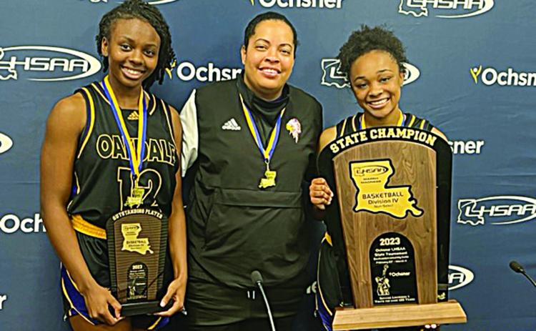 From left are Most Outstanding Player Emani Young, Oakdale girls basketball head coach and Ville Platte native Renotta Edwards, and Kaylee Bradley. (LSN photo by Tony Marks)