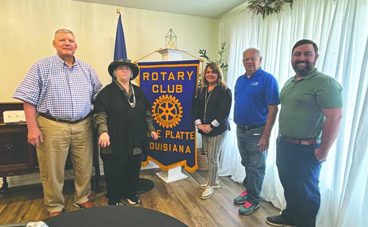 HISTORY OF LOUISIANA ORPHAN TRAIN SHARED - Shown, from left, are Rotarian Peter Strawitz, Laine LaTour, Martha Aubert (president of the Louisiana Orphan Train Museum in Opelousas), museum board member James Douget and Rotary President Beau Wilson. LaTour, Aubert and Douget spoke about their work with and connection to the Louisiana Orphan Train riders that came from New York City to Opelousas. (Gazette photo by Heather Bogard)