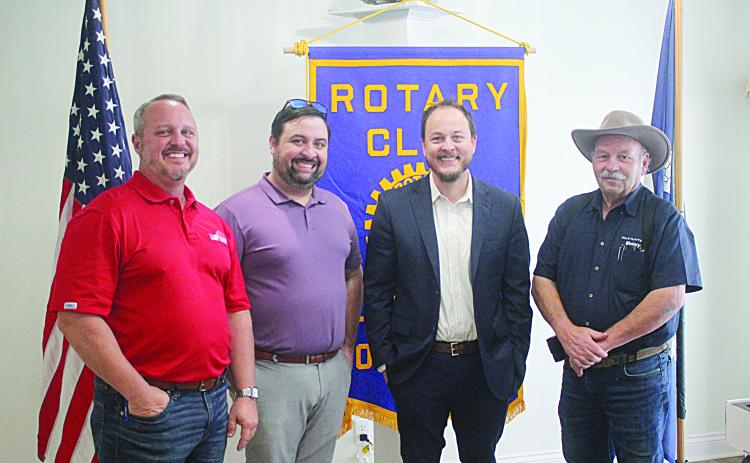 Pictured from left are David Domingue, senior sales representative of LUS Fiber; Rotarian Beau Wilson; Scott Prather, public relations manager of LUS Fiber; and Rotary President Bob Manuel. (Gazette photo by Tony Marks)