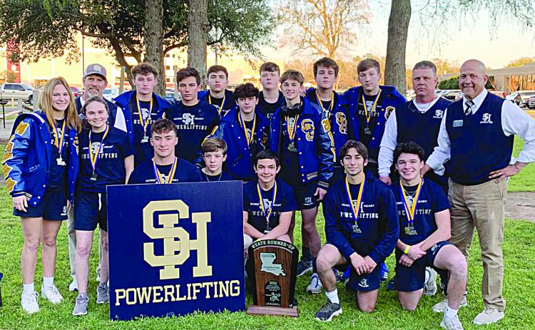 The Sacred Heart Trojan powerlifting team competed at the state championships and returned home as runner-up. Pictured in no particular order are Jackson Manuel, Isiah Rion, Jesse Johnson, Jude Hebert, Hunter Pitre, Michael Fontenot, Colton Manuel, Dylan Doucet, Everette Johnson, Silas Chesne, Madeline Fuselier, Adeline Launey, Lily Deshotel, Abby Quibodeaux, head coach Duane Urbina, assistant coach Robert Soileau, and assistant coach Jacob Reed. Not pictured- statisticians Kristen Ardoin and Carley Cloud