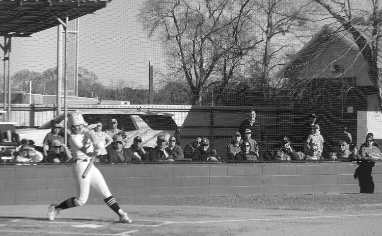 Catherine Larson connects with a pitch for a home run in Sacred Heart’s win over Pine Prairie. (Gazette photo by Rhett Manuel)