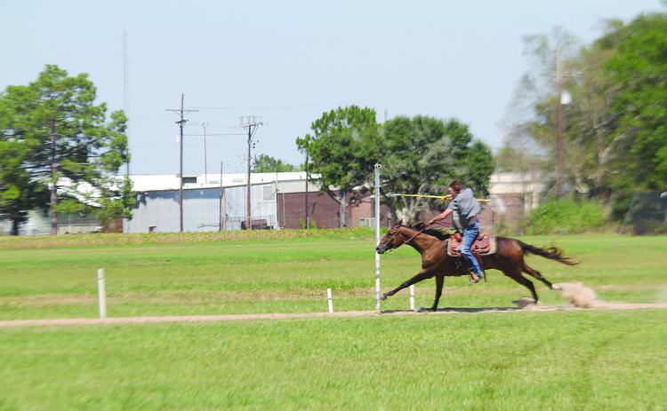 Brandon Snoke is pictured as he attempts to collect a ring during qualifications for the Louisiana Tournoi on Sunday, September 10. (Gazette photo by Tony Marks)