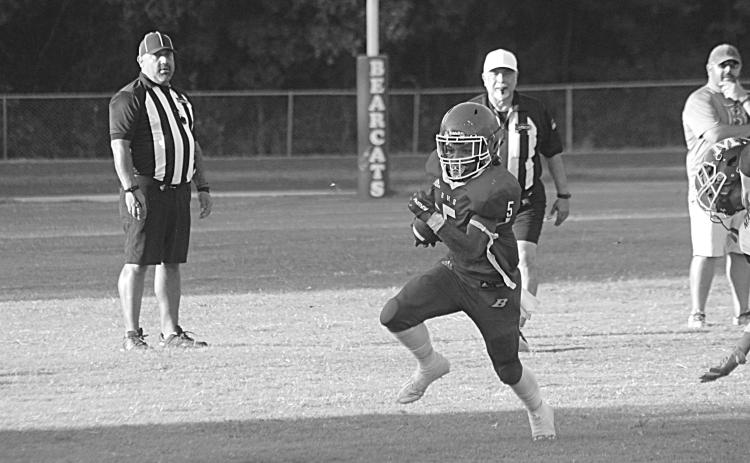 Basile’s Bryan Hardy (5) finds a running lane in the scrimmage Thursday night. (Gazette photo by Rhett Manuel)