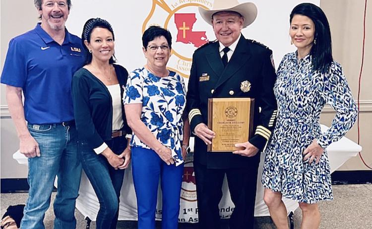 Pictured from left are Ben Marcantel, Hollie Guillory, Pam Guillory, Sheriff Charles Guillory, and Whitney Guillory. The sheriff is pictured with an award for being inducted into the Louisiana First Responders Christian Association Hall of Fame on Friday, October 25, in Lafayette. (Photo courtesy of Evangeline Parish Sheriff’s Office)