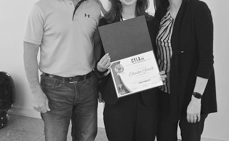 Charlee Smith (center) is shown with her parents Chris and Krystle Smith at the CYLA awards program in Baton Rouge.