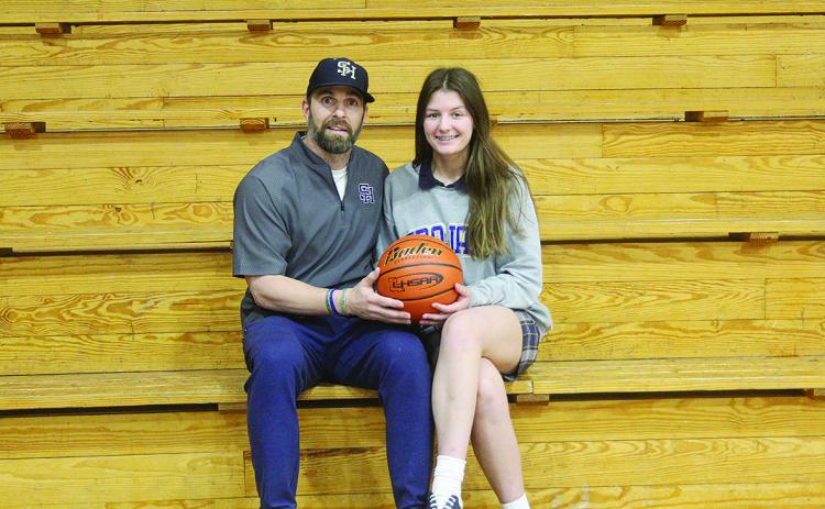 Sacred Heart High head coach Josh Harper (left) has been named the 2022 Ville Platte Gazette’s Coach of the Year for girls’ basketball in Evangeline Parish after leading his team to a postseason run after a three-win season a year ago.