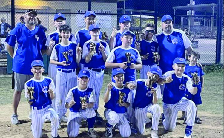 The Cubs won the city championship in the Majors division of Ville Platte Dixie Youth. Pictured with their coaches Nicholas Fontenot and Tibby Figueiredo are team members Jax Fontenot, Brecken Figueiredo, Liam Vidrine, Landon Fontenot, Gage Berard, Dietrich Lavan Jr., Andre Morein, Brant Lejeune, Rhett Guillory, Noah Nicks, Nicholas Soileau, and Brayden McClaskey.  (Photo courtesy of Nicholas Fontenot)