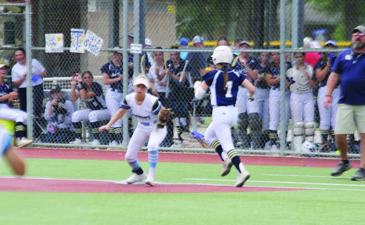 Sacred Heart’s Jacelyn Pitre (7) hustles down the first base line during the Lady Trojans’ 13-3 loss to district rival Catholic-Pointe Coupee in the state softball seminfinals at Sulphur. (Gazette photo by Rhett Manuel)