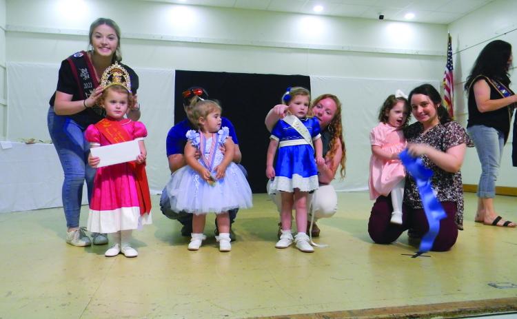 TINY MISS COURT - Shown, from left, are the members of the Tiny Miss Viande Boucanèe Court. They are Queen Oakley Airhart; Olivia Elizabeth Rose Carrier, first runner-up; Rainee Lynn Johnson, second runner-up; and Demi Herboldsheimer, third runner-up.