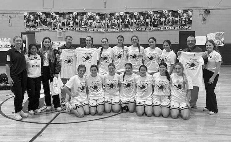 The Sacred Heart Lady Trojans finished as runner-up in the annual Turkey Tournament. Pictured are Head Coach Craig Whittington, Assistant Coach Shane Darbonne, Manager Caroline Richardson, Videographer Layla McElwee, Statisticians Emily Ardoin and Jenna Manuel, and players Taylor Darbonne, Kali Shiver, Jodie Landry, Ava Johnson, Rose Ardoin, Jolie Vidrine, Olivia Tate, Laura Prudhomme, Breanne Ardoin,  Averie Pitre, Mary Perron, Alyssa Brignac, and Josie Vidrine.  (LSN photo by Tony Marks)
