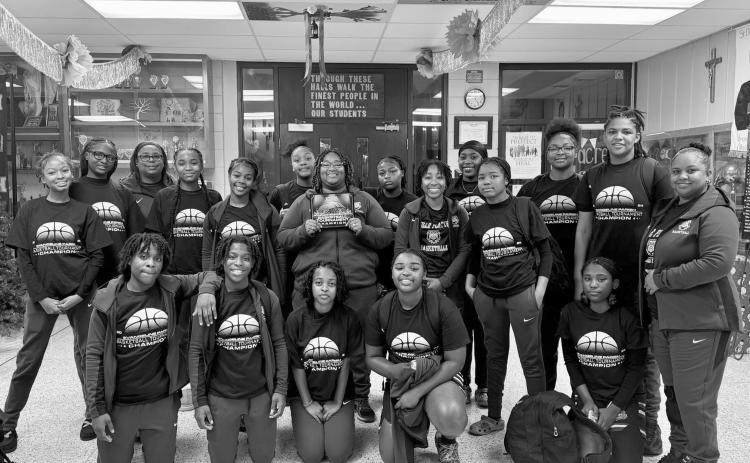 In the left photo is the girls’ team which includes players Britelah Freeman, Yazmin Ardoin, Janiah Leday, Marlei Doucet, Aniyah James, Keanna Castille, Danasha Jack, Leah Clark, Cassie West, Brileyah Freeman, Raeosha Thomas, Toni Falkenberry, Kaitlyn Ferguson, Kadrionna Lewis, and Chauncey Tezeno.