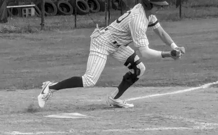 Landon LeBlanc (20) attempts to lay down a bunt. (Gazette photo by Rhett Manuel)