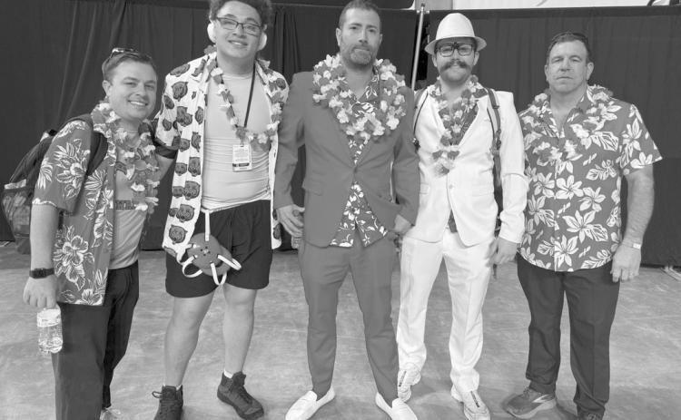 BEST-DRESSED AT STATE - The La. High School Coaches Association shared this photo above on Facebook prior to the championship rounds of the state wrestling tourney with the following caption: Waiting to see who will be State Champions on the mats, but we have confirmed a front runner in best dressed…introducing the Basile Bearcat coaching staff. From left are Ben Bertrand, Romyn Cortez, senior wrestler; Patrick Fontenot, Gabe Duplechin, and Jason Ashford.