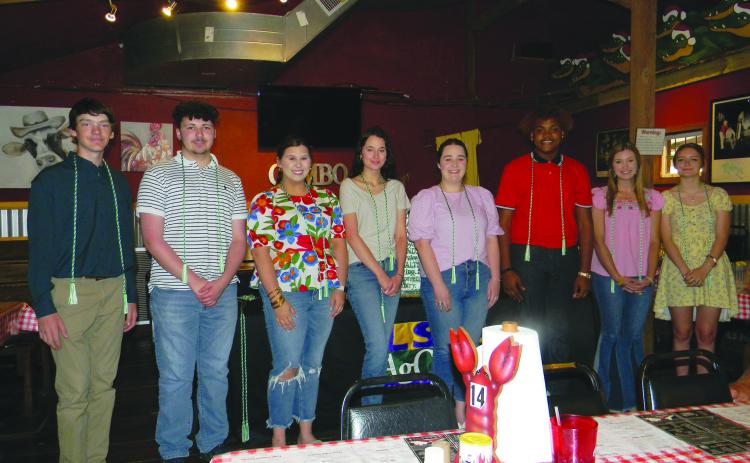 SENIORS RECEIVE HONOR CORDS - Graduating senior 4-H club members in attendance received their honor cords during the annual 4-H Awards Banquet held Tuesday, May 10, at the Crawfish Barn. Shown, from left, are Benjamin Fontenot, Cameron Vizinat, Josi Soileau, Olivia Mayeaux, Lillian Guillory, Jordan Edwards, Emily Deshotel and Madison Courville. (Gazette photos by Heather Bogard)