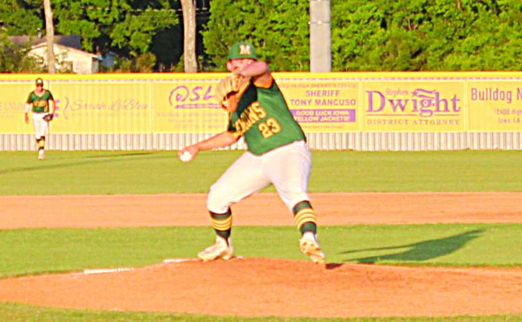 Wyatt Johnson (23) prepares to deliver a pitch in Mamou’s playoff series against Iowa.  (Gazette photo by Rhett Manuel)