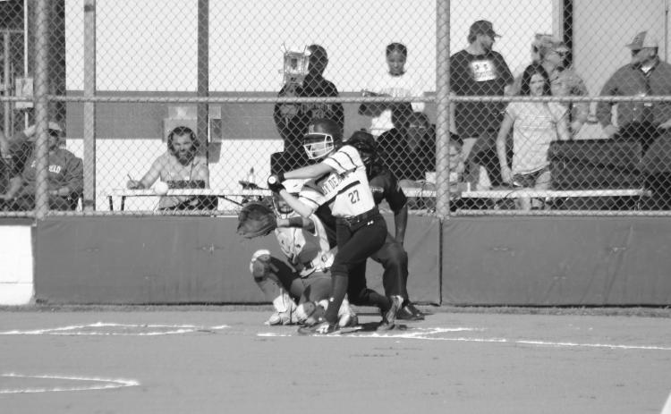 Jennifer Fontenot (27) waits for a pitch to cross home plate in Mamou’s playoff opening win against Springfield. (Gazette photo by Rhett Manuel)
