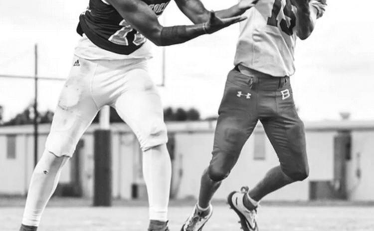 Bearcat Ricky Malone (15) battles a Beau Chene Gator for a pass possession. (Photo by Tonya Ortego)
