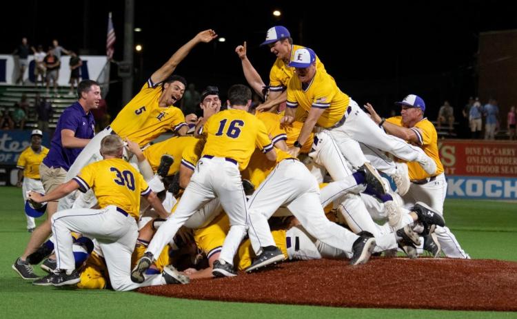 Members of the LSUE baseball team celebrate on the field after capturing their 8th national championship in program history. (Photo courtesy of LSUE Athletics)