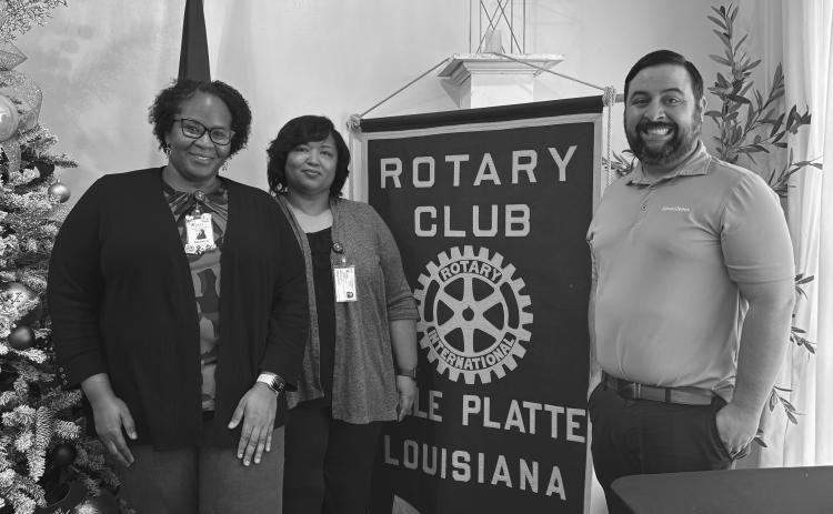 CASA VOLUNTEERS NEEDED - Shown, from left, are Madelyn Rosette and Annette Fruge with CASA and Rotary President Beau Wilson. (Gazette photo by Heather Bogard)