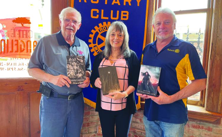 LAWSON DISCUSSES SELF PUBLISHING - Debby Lawson visited the February 28, meeting of the VIile Platte Rotary Club to discuss the process of writing novels and getting them self-published. Shown, from left, are Rotarian Kermit Miller (left), Lawson and Rotary President Larry Lachney (right). (Gazette photo by Heather Bogard)