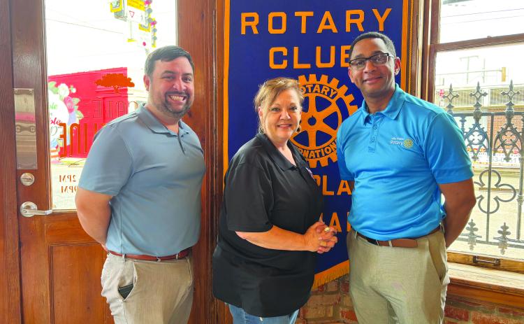 UPDATE GIVEN ON ACOSTA FOUNDATION -  Connie Acosta Lamke, center, gave an update on the Acosta Foundation’s upcoming events during the April 2, meeting of the Ville Platte Rotary Club. She is shown with Rotarian Beau Wilson, left, and Rotary President Brian Ardoin. (Gazette photo by Heather Bogard)