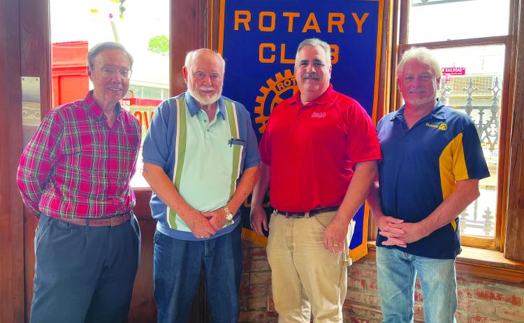 ROTARIANS LEARN ABOUT KVPI - KVPI General Manager Mark Layne and Floyd Soileau were guest speakers for the April 25, meeting of the Ville Platte Rotary Club. Shown, from left, are Layne, Soileau, Rotarian Scott Smith and Rotary President Larry Lachney. (Gazette photo by Heather Bogard)