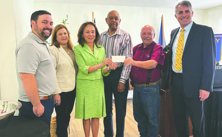 LSUE SCHOLARSHIP PRESENTED - During the May 6, meeting of the Ville Platte Rotary Club, the group presented its annual LSUE Scholarship donation to the school. Shown, from left, are Rotarian Beau Wilson; Carey Lawson, Executive Director of the LSUE Foundation; Dr. Nancee Sorenson, Chancellor of LSUE; Rotarian Clem LaFleur; Rotary President Bob Manuel; and Dr. John Hamlin, Vice Chancellor for Academic Affairs at LSUE. (Gazette photo by Heather Bogard)