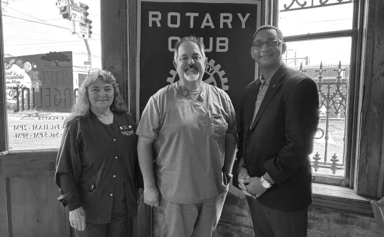 HERITAGE MANOR UPDATE GIVEN -  Shown, from left, are Rotarian Patricia Duplechin, Rotarian and Heritage Manor Nursing Home Administrator Trey Prudhomme and Rotary President Brian Ardoin. (Gazette photo by Heather Bogard)