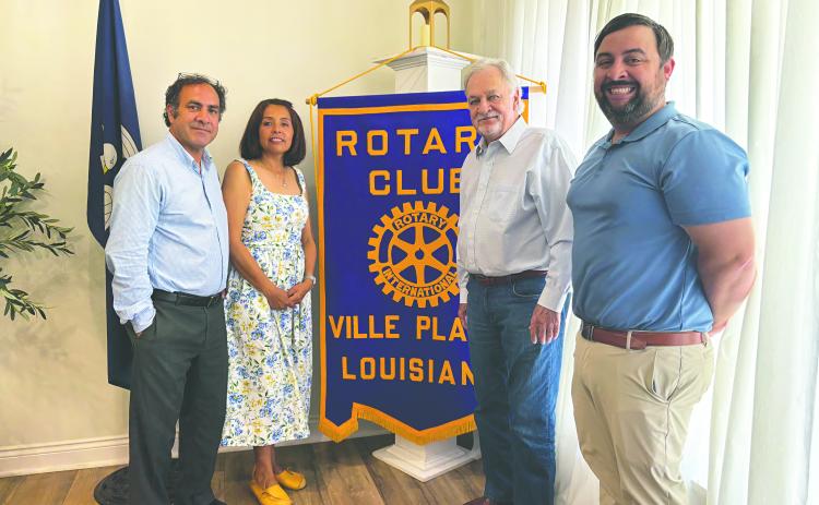 SAWTELLES SHARE CAMINO JOURNEY - Shown, from left, are Pastor Steven and Sarahi Sawtelle, Rotarian Dr. William “Tojo” Ward and Rotary President Beau Wilson. During the May 26, meeting of the Ville Platte Rotary Club, The Sawtelles shared their experience walking the Camino in Spain for 28 days. (Gazette photo by Heather Bogard)