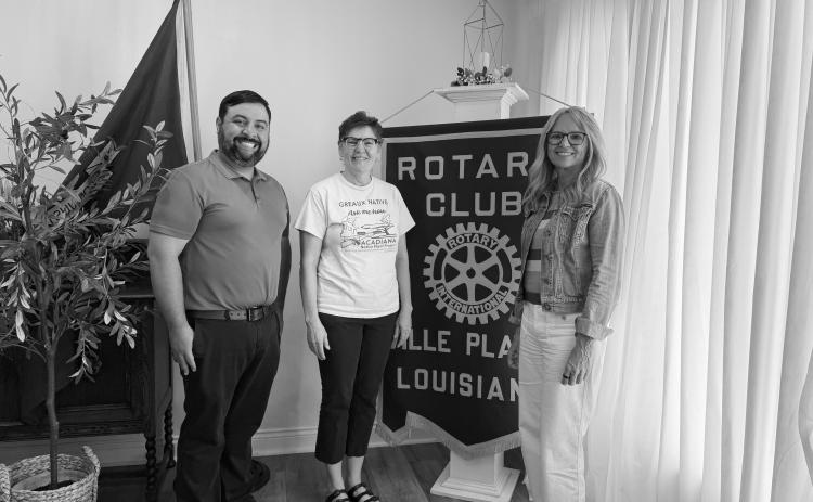 ROTARIANS LEARN ABOUT NATIVE PLANTS - Dr. Phyllis Griffard with the Acadiana Native Plant Project (center) shared an update on the organization’s work in promoting native plants. She is shown with Rotary President Beau Wilson (left) and Rotarian Nicole Wenger (right). (Gazette photo by Heather Bogard)