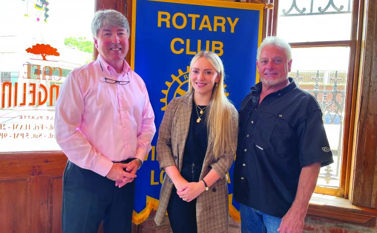 NEW AESTHETIC SERVICES AVAILABLE - Darrelyn Lachney visited the June 7, meeting of the Ville Platte Rotary Club to discuss her new aesthetic venture and the services that will be available. She is shown with Rotary President Jimmy LeBlanc, left, and her father and Rotarian Larry Lachney, right. (Gazette photo by Heather Bogard)
