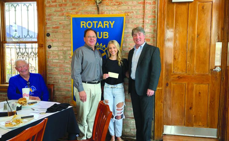 VP ROTARY PRESENTS SCHOLARSHIP - Catherine Fontenot was presented with the RYLA scholarship during the July 27, meeting of the Ville Platte Rotary Club. She is shown with board member Wayne Vidrine, left, and Rotary President Jimmy LeBlanc, right.