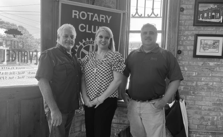 SENIOR LOW-COST LIVING ADDRESSED - Savoy Heights Property Manager Amanda  Duplechin (center) addressed the August 2, meeting of the Ville Platte Rotary Club. She is shown with Rotary President Larry Lachney (left) and Rotarian Scott Smith (right). (Gazette photo by Heather Bogard)