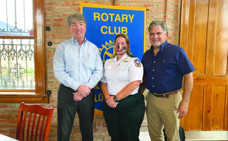 VP ROTARY WELCOMES SPEAKER - Rotarian Eric Gil, right, welcomed Amy Guidry, center, with Acadian Ambulance as the guest speaker for the August 3, meeting of the Ville Platte Rotary Club. They are shown with Rotary President Jimmy LeBlanc, left. (Gazette photo by Heather Bogard)
