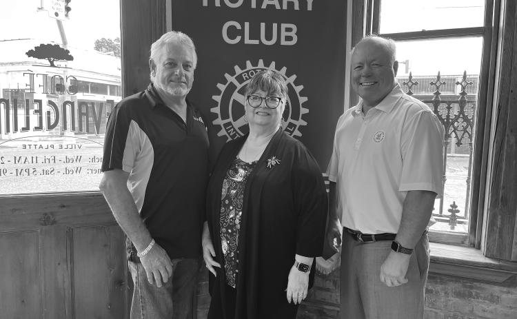 UNITED WAY UPDATE GIVEN - St. Landry-Evangeline United Way Executive Director Ginger LeCompte (center) addressed the August 9, meeting of the Ville Platte Rotary Club. She is shown with Rotary President Larry Lachney (left) and Rotarian Dr. Hosea “Joey” Soileau (right). (Gazette photo by Heather Bogard)