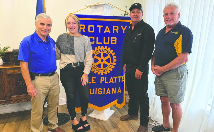 HISTORY SHARED - Tournoi rider and board member of the Louisiana Tournoi Association Bryan Fontenot visited the September 1, meeting of the Ville Platte Rotary Club to talk about the upcoming annual running of the Tournoi. Shown, from left, are Rotary President Dr. Kirk Soileau, Darrelyn Lachney (2014 Teen Tournoi Queen and 2012 Junior Tournoi Queen), Fontenot and Rotarian Larry Lachney (2014 Cotton Festival parade marshal). (Gazette photo by Heather Bogard)