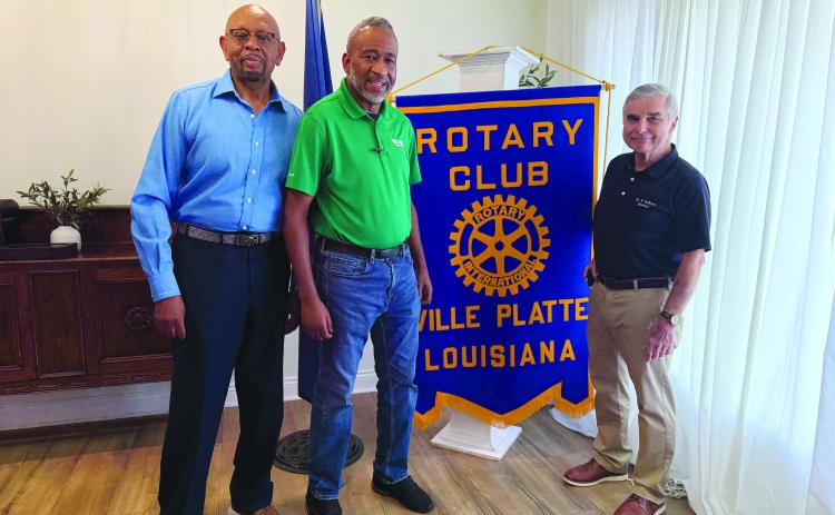 PITRE SHARES WORK JOURNEY - Shawn Pitre (center) shared his 31-year career with Doug Ashy Building Materials in Ville Platte during the September 8, meeting of the Ville Platte Rotary Club. He is shown with Rotarian Clem LaFleur (left) and Rotary President Dr. Kirk Soileau (right). (Gazette photo by Heather Bogard)