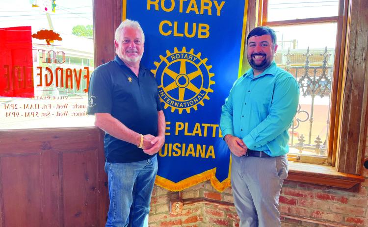 MID-TERM ELECTIONS DISCUSSED - Rotarian Beau Wilson, right, addressed his fellow club members with an update on the upcoming mid-term elections during the meeting held September 13. He is showm with Rotary President Larry Lachney. (Gazette photo by Heather Bogard)