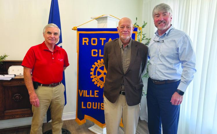 JUDGE WEST SHARES UPDATE - Judge Chuck West (center) shared his 31-year career with Doug Ashy Building Materials in Ville Platte during the September 8, meeting of the Ville Platte Rotary Club. He is shown with Rotary President Dr. Kirk Soileau (left) and Rotarian Jimmy LeBlanc (right). (Gazette photo by Heather Bogard)