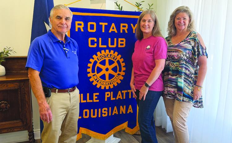 PLANS FOR COTTON FESTIVAL SHARED - Kim McDaniel, president of the Louisiana Cotton Festival Association, (center) addressed the September 22, meeting of the Ville Platte Rotary Club with details on the upcoming festival. She is shown with Rotary President Dr. Kirk Soileau (left) and Rotarian Misty Parker (right). (Gazette photo by Heather Bogard)
