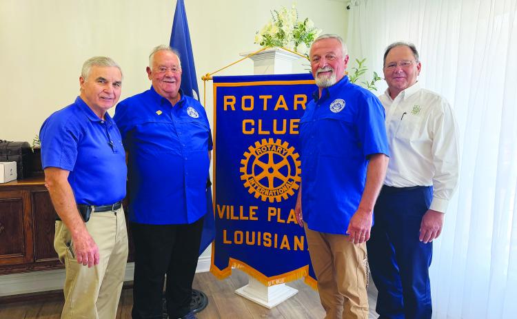 PUBLIC SERVICE COMMISSIONER ADDRESSES CLUB - Public Service Commissioner Mike Francis addressed the September 29, meeting of the Ville Platte Rotary Club with an update on the commission’s work. Shown, from left, are Rotary President Dr. Kirk Soileau, Francis, executive assistant Eric Duplechain and Rotarian Wayne Vidrine. (Gazette photo by Heather Bogard)
