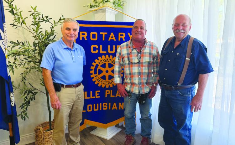 NOVEMBER ELECTION UPDATE GIVEN - Evangeline Parish Registrar of Voters Lucas Buller (center) visited the October 6, meeting of the Ville Platte Rotary Club with details on the large parish-wide ballot for the November 3, election. He is shown with Rotary President Dr. Kirk Soileau (left) and Rotarian Bob Manuel (right). (Gazette photo by Heather Bogard)